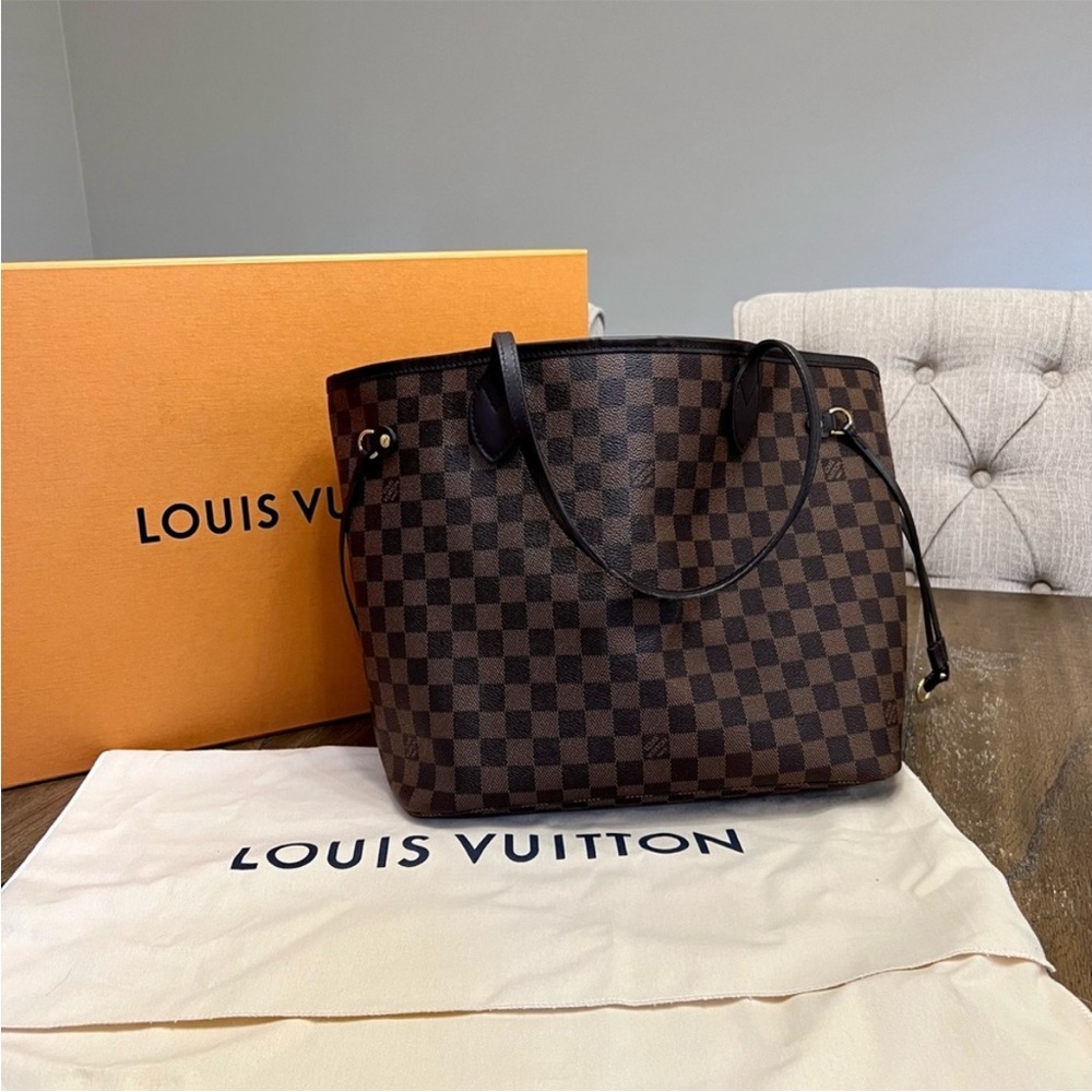 Authentic Louis Vuitton Neverfull MM tote with matching wallet.